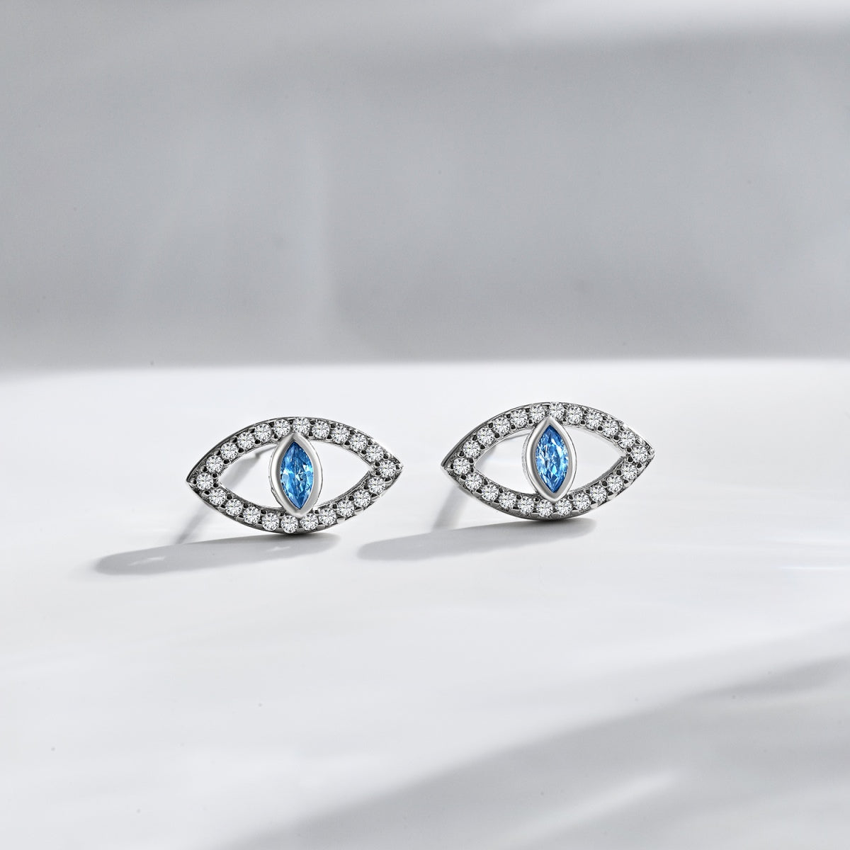 [Sparkling Aurora]Blue Devil Eyes Hollow Stud Earrings